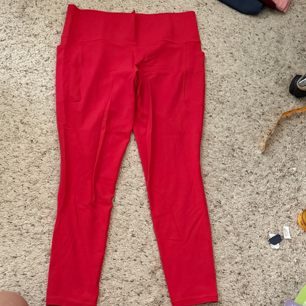 Athleta Salutation Stash leggings. Size L